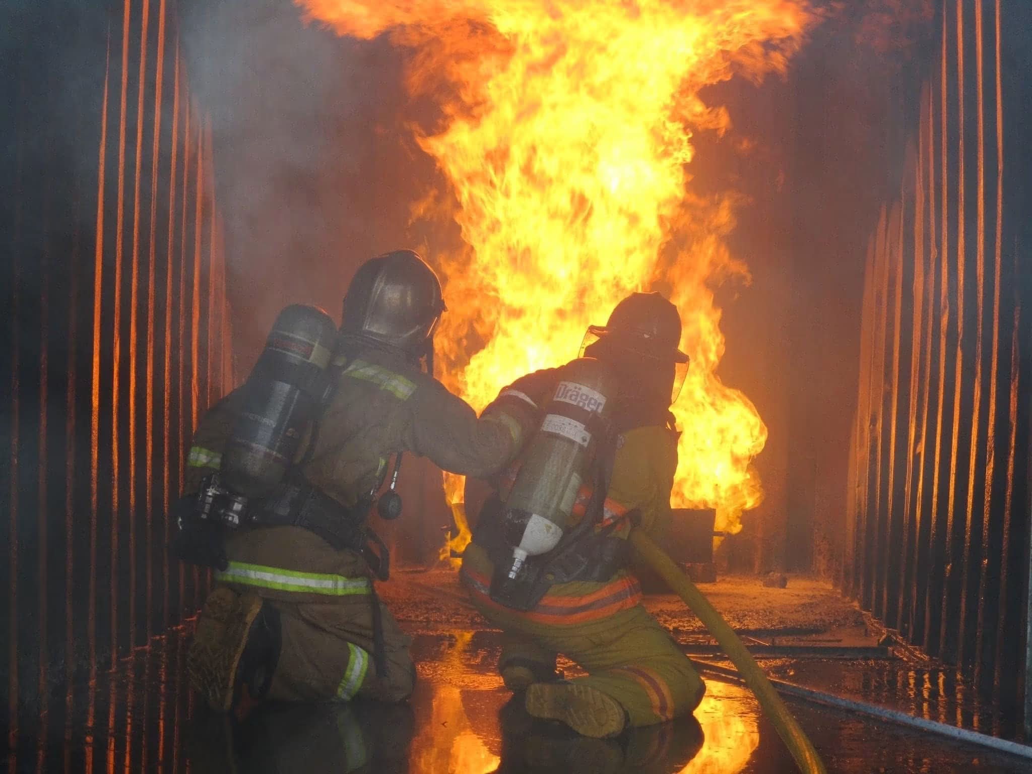 Firefighters in turnout gear and breathing apparatus